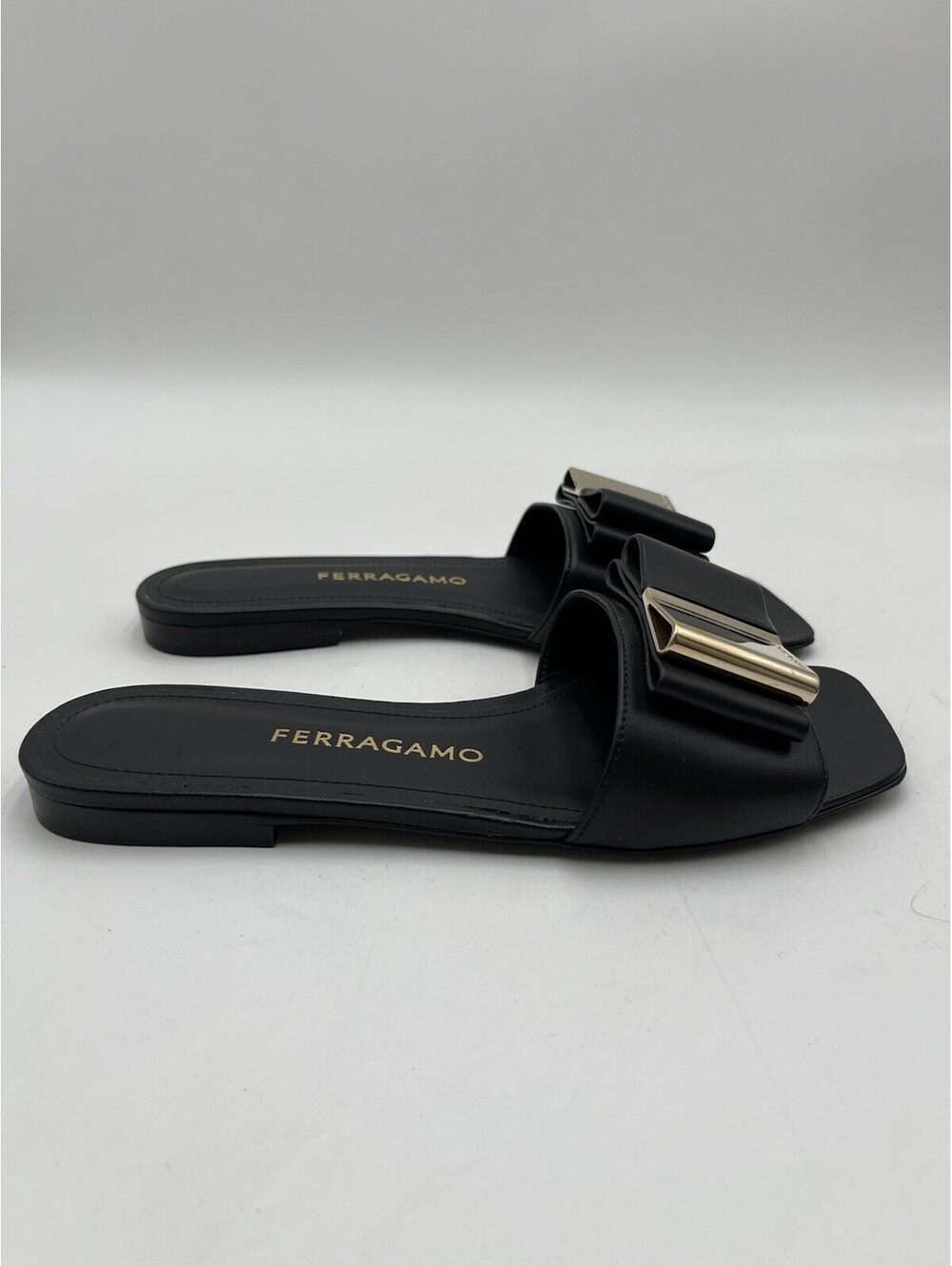 Ferragamo Lyana leather slide sandals in black gold-tone Gancin Buckle Size 6